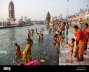 people bathing and making puja on ganga ghat in haridwar in india ay8y6p.jpg from indian desi vill puja bath in room