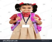 stock photo indian primary school girl in uniform with school bag over shoulder isolated on white 180322805.jpg from indian school 16 age sex bad wep saxvideo coamil housewife rape
