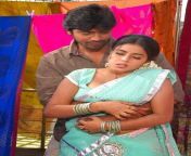 south actress poorna boobs press while romance in saree blouse by co actor from behind.jpg from acter poorna hot bed romance