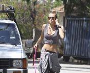 miley cyrus jogging with her dog 028.jpg from kittygfs com