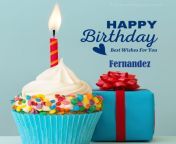 happy birthday fernandez written on image blue cup cake and burning candle blue gift boxes with red ribon.jpg from happy birthday fernandez