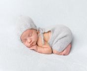tender little baby comfortably sleeping belly newborn tushy up pose white blanket 114271620.jpg from sleeping tushy