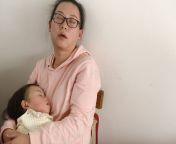 tired mom daughter sleeping sitting chair chinese against white wall 175028007.jpg from sleeping chinese mom hard sex