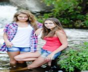 two pretty young women standing outdoors summer day near waterfall 29716656.jpg from nudist teens 3