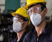 workers wear protective mask quarantine time to protect spreading covid standing confident action his 197480287.jpg from wear mask quarantine
