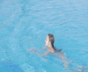 young girl white bikini swims swimming pool teen girl enjoys summer vacation sunny day water outdoor teen girl 107393468.jpg from teen gİrl