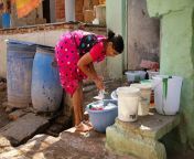 indian woman sari washing clothes near house 30025109.jpg from tamil aunty washing