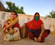 indian village mother daughter siting together holded luggage sky background india may indian village mother 183669997.jpg from indian village daughter