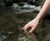 mature woman hands touching wetting water lake mountain video close up 195679690 jpgw400 from mature wetting