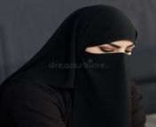 muslim woman niqab qatar portrait arabic young woman qatar traditional islamic cloth niqab against dark 121421125.jpg from burkha wali arabian lady