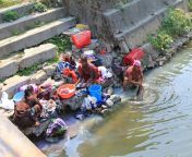 nepalese women washing clothes along river pokhara nepal april april pokhara city nepal 47885181.jpg from nepali dress changing save water