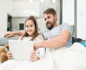 portrait bearded father using laptop bed enjoying evening teenage daughter watching movies father watching videos 109713493.jpg from tamiitep father fucking daughter mom watching and shockedবাংলা দ§