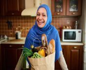 beautiful middle eastern muslim woman pretty housewife head covered blue hijab smiling cheerful toothy smile standing 258786875.jpg from mushhlim house wife fock hard coure