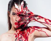 blood lily scary sexy halloween look beautiful young brunette girl white background blood flower makeup face art blood lily 163482620.jpg from 163482620 jpg