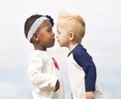 diverse little kids first kiss 22889562.jpg from two lip kiss american