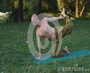 young bald boy naked torso engages gymnastics yoga performs asanas glade forest young guy naked torso 109867974.jpg from naked young teenw sex 89 bhojpuri comা
