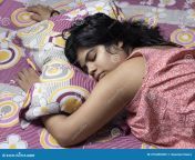 top view indian asian woman sleeping bed sleeping daytime 216206965.jpg from desi sleeping se