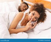 unhappy marriage cheating black women talking privately cellphone hiding her sleeping husband cheating black woman talking 161888208.jpg from cheating on phone talking to my 18 old girlfriend getting head from sum man’s wife n his bed