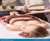 woman enjoying ayurveda oil massage spa treatment 44634741.jpg from saxmassage