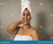 happy latin mature woman having skin care spa day happy latin mature woman having skin care spa day people wellness lifestyle 232247166.jpg from latín mature