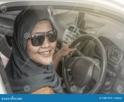 muslim lady driving her car smiling portrait asian muslim lady smiling drive her car lifestyle having fun leisure 138811875.jpg from muslim grils car sexnty romence unc
