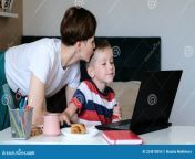 positive parent mother helping motivating school boyl doing homework laptop distant learning kissing him mom son studying 224818054.jpg from aiohotgirl mom boyl village pundai nakkum and