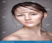 portrait young beautiful nude woman wet shining makeup grey background hair 69483597.jpg from beautiful young nude