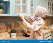 pretty muslim housewife hijab opens kitchen cabinet modern kitchen pretty muslim housewife hijab opens kitchen cabinet 180411045.jpg from muslim house wife xxww japan xxx