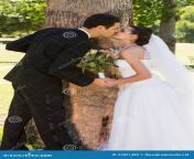 romantic newlywed couple kissing park side view 37821489.jpg from newly wed couple kissing