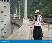 asian thai woman traveler visit bhumibol dam spillways formerly known as yanhee dam july tak thailand asian thai 115375182.jpg from thai asian 18
