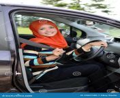 beautiful young muslim drive car asian woman head scarf smile 39601586.jpg from muslim grils car sexnty romence unc