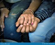 boyfriend girlfriend holding each others hand sitting seat 144511390.jpg from apachan nudeengali boyfriend girlfriend
