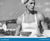 chef cook nude sexy muscular torso man confident face wears cooking hat apron skyline background cook chef cook 129637386.jpg from cook photo nude