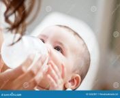 close up mother giving milk to her son 16262831.jpg from mommy giving breast milk