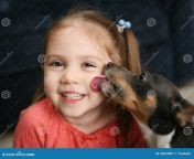 cute girl being licked dog 18224051.jpg from licked
