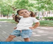 cute smiling little girl years old white t shirt park outdoor cute smiling little girl years old white t shirt park 177259712.jpg from 5 eyr little grle sex