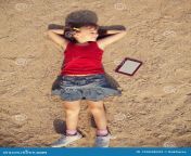 dreaming smiling cute little girl lying sand tablet computer child vacation dreaming smiling cute little girl 139638043.jpg from depositphotos 219440118 stock photo little brother sister having fun jpg