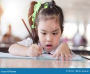 education school concept asian japan chinese korea pretty girl hold book reading 73941659.jpg from ed asian