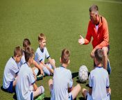 cropped coach instructing football team in field 2r8sjzb.jpg from he choose footbal instead of sex