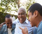 senior black man talking with his adult sons low res.jpg from old black man my sweet wife