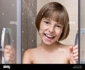 girl bathing under shower gf6rp4.jpg from bathing under shower 260nw 81406105 jpg