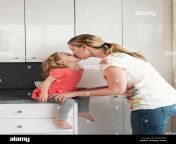 mother kissing her daughter r54m5r.jpg from mom kis