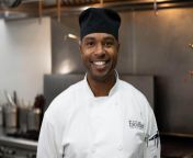 chef in uniform posing for a photo in a kitchen 1400.jpg from chef