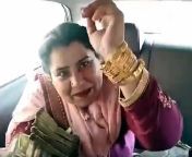 indian aunty shows off lots of cash and jewellery with a gun gold bangles.jpg from desi aunty with young
