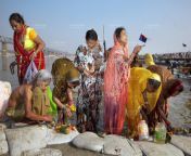 0034 india allahabad maha kumbh mela puja ganges worship adoration women pray 2013.jpg from kumbh snan indian women bath wet nipple