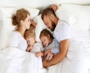 family sleeping.jpg from son share bed with parents free