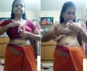 tamil village iyer maami showing milky boobs.jpg from tamil village aunty removing her pavadai and bra in open p