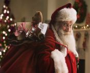 santa claus carrying sack of gifts portrait close royalty free image 1629995201.jpg from santa is
