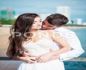 2d6842027981e0f8fba939bf97cfe5a5.jpg from newly wed couple kissing