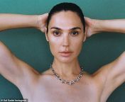 76219189 12599287 va va voom gal gadot remained topless in a promotional photo for a 130 1696536748445.jpg from gal gadot nude photo